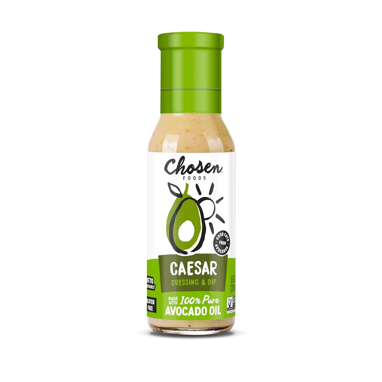Chosen Foods Avocado Oil Caesar Dressing bottle on a fresh salad